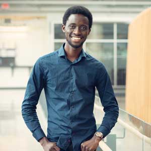 Portrait of a Black graduate student.